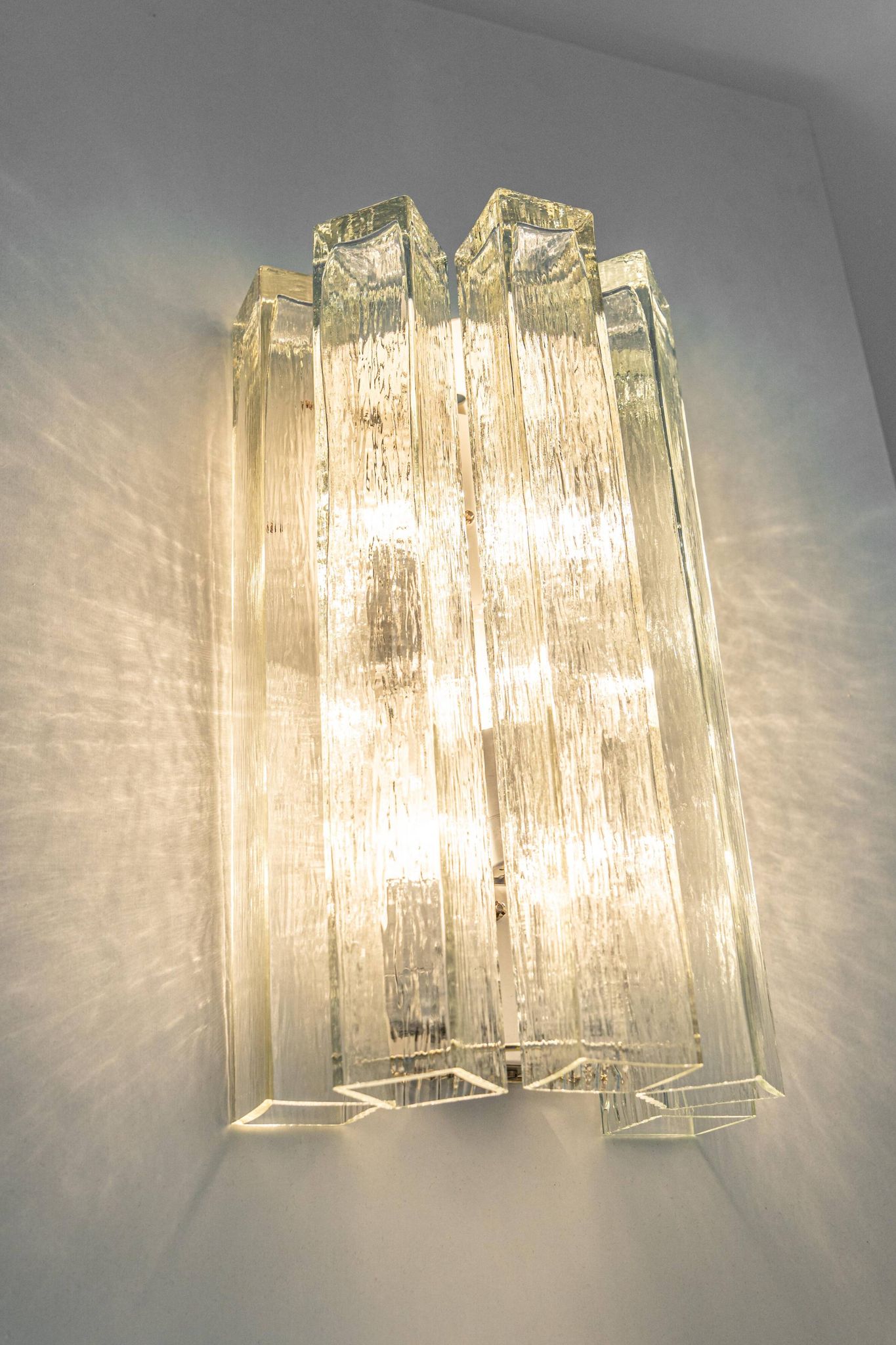 Large pair of wall sconces in brass and Murano glass by Doria, Germany, 1960s.