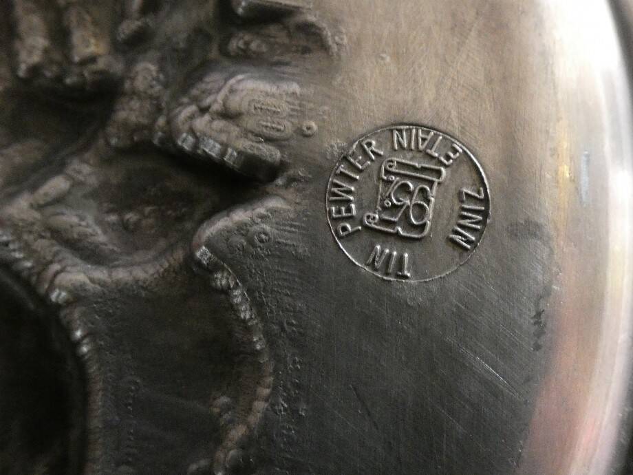 pewter plate with fruit decor