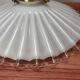 Two wall sconces in serrated white opaline