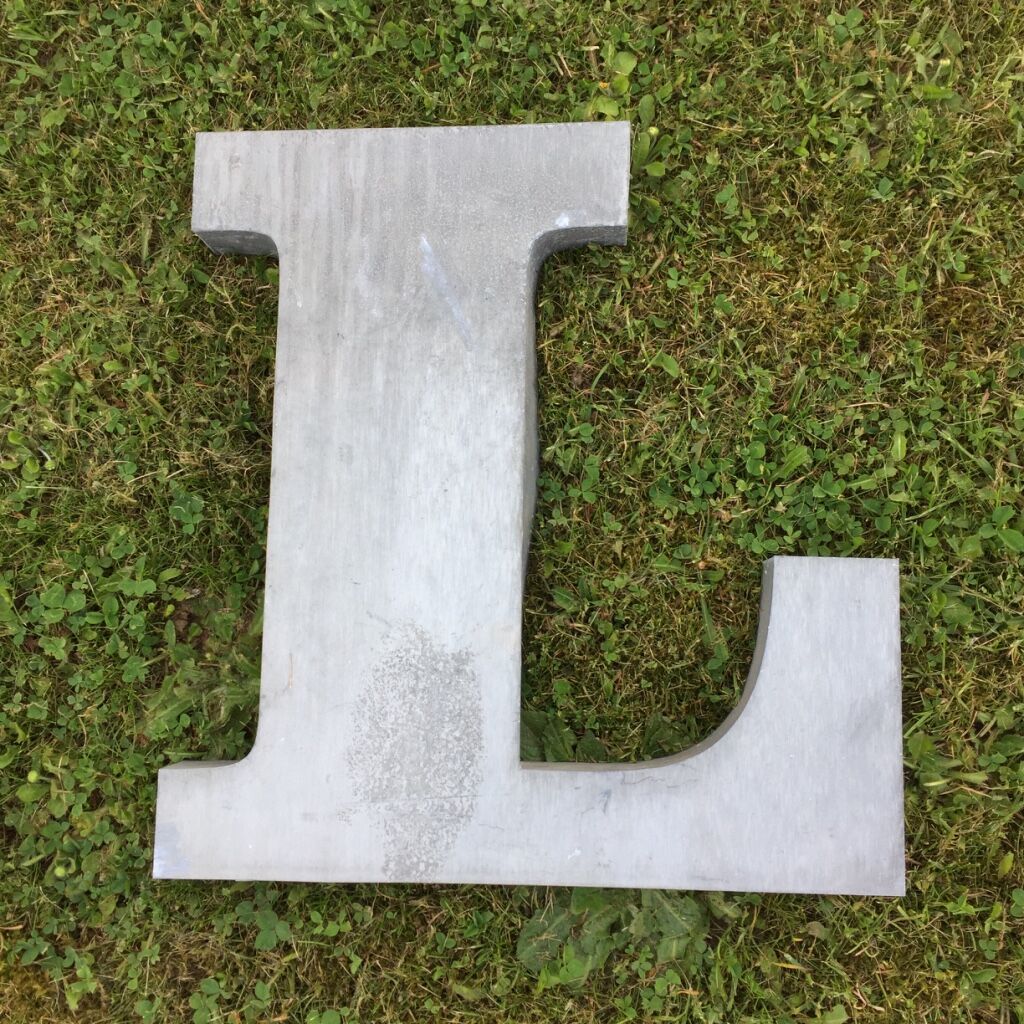 Ten letters sign in zinc material