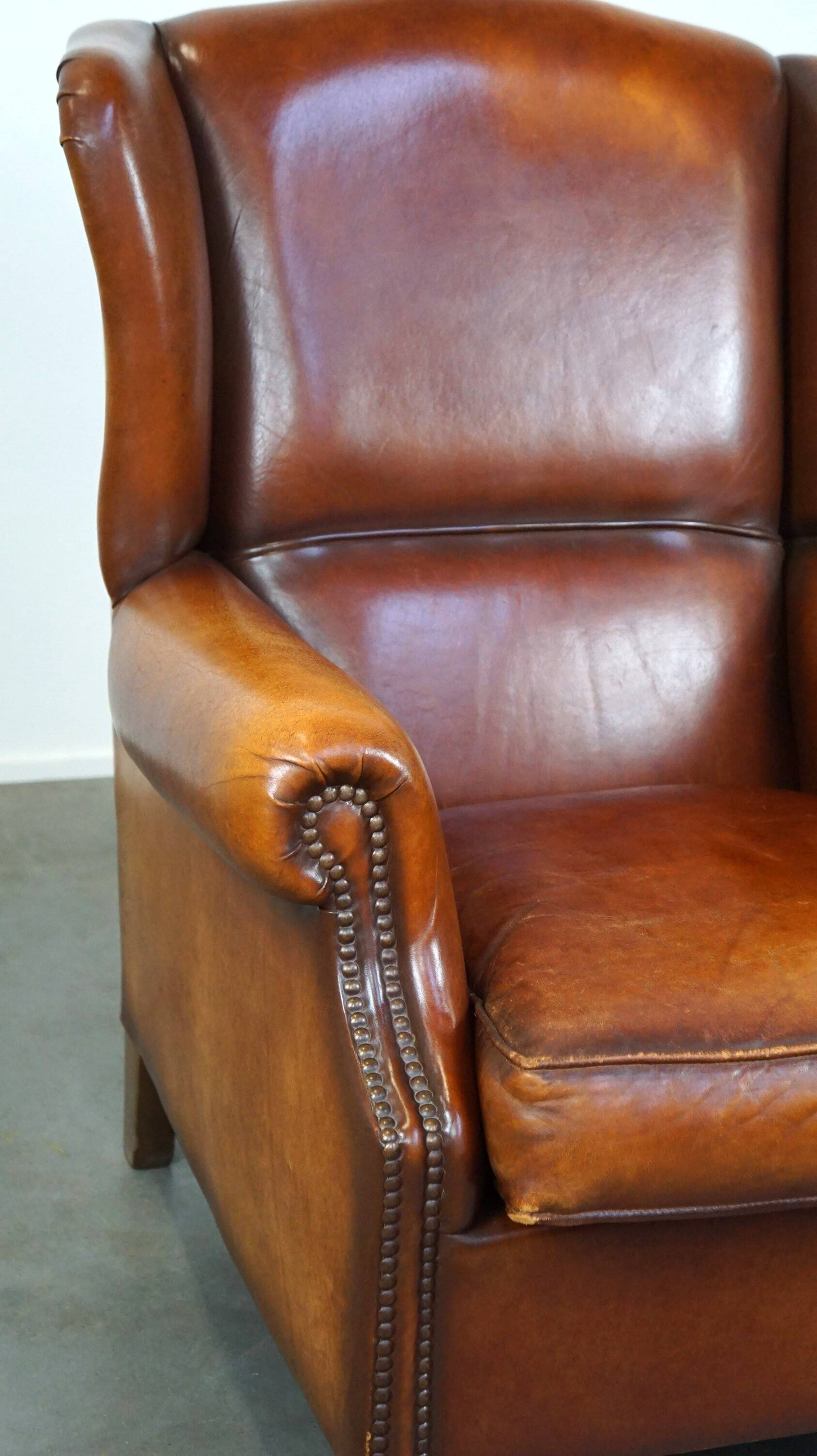 Beautiful and Comfortable Sheepskin Wingback Armchair with a Wonderful Patina