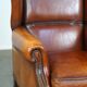 Beautiful and Comfortable Sheepskin Wingback Armchair with a Wonderful Patina