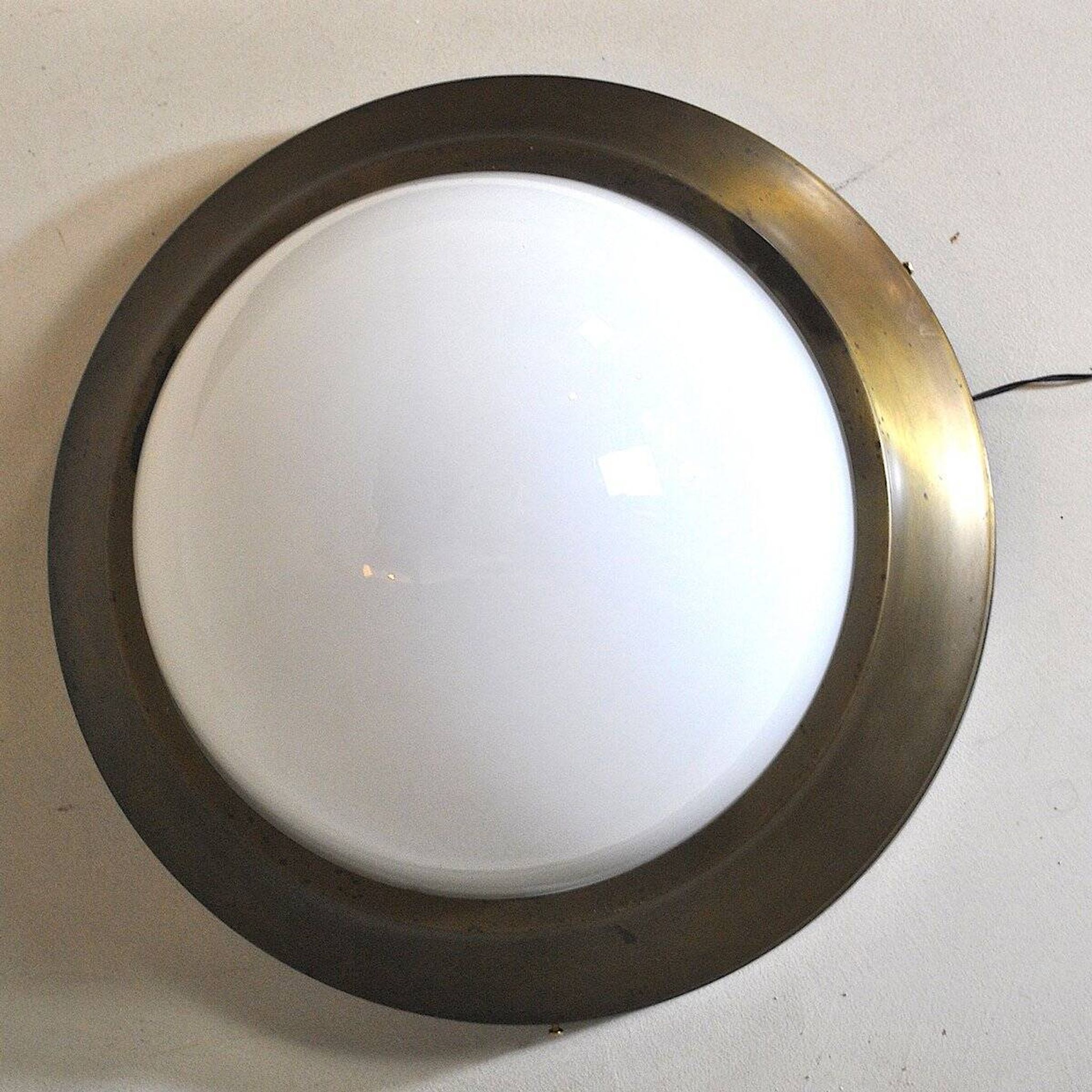 Wall lamp in the style of Pier Luigi Caccia Dominioni, 1960s.