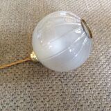 Glass ball suspension