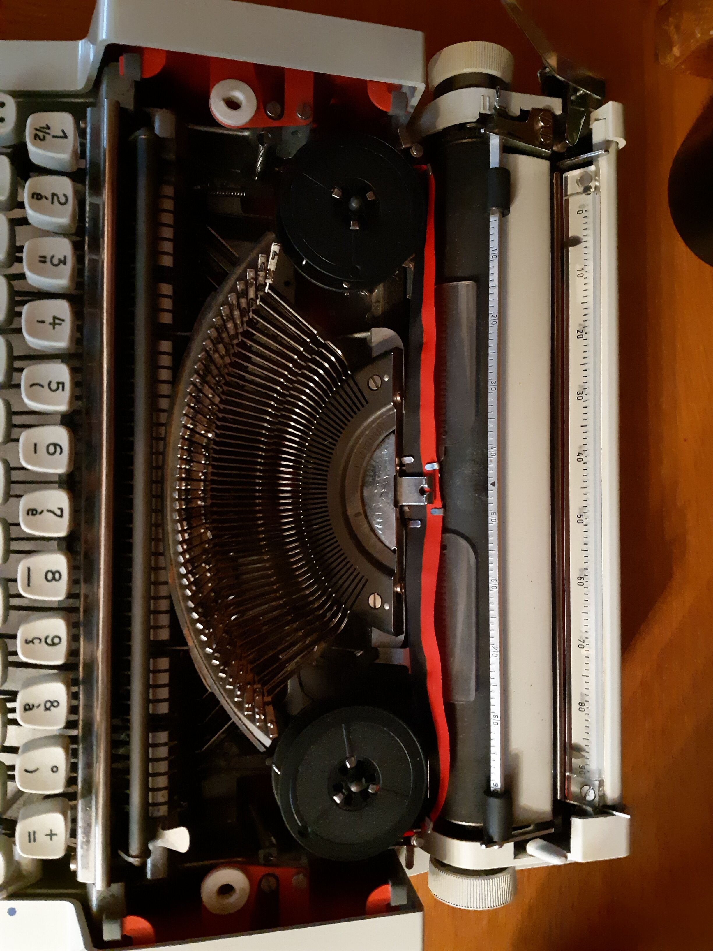 Portable typewriter " Olympia traveller de luxe " , red , in working order