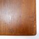 Vintage solid wood side table on casters