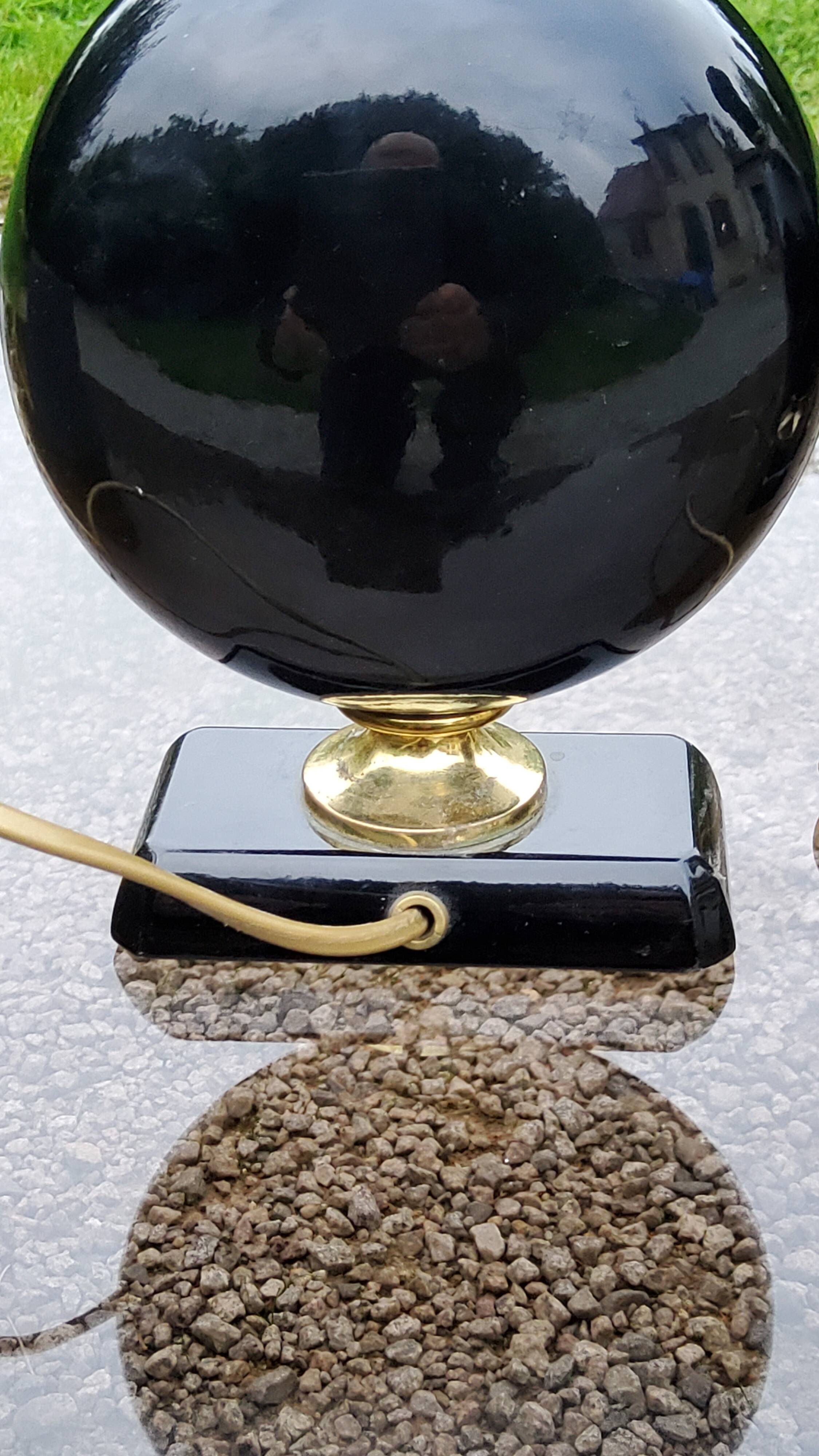 Pair of 70s designer lamps in black ceramic and gold metal