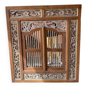 ANTIQUE INDONESIAN CARVED MIRROR WITH SOLID TEAK SHUTTERS PAINTED FLORAL DECOR