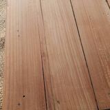 Low farmhouse table in raw wood