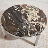 Coffee table with a stone top.