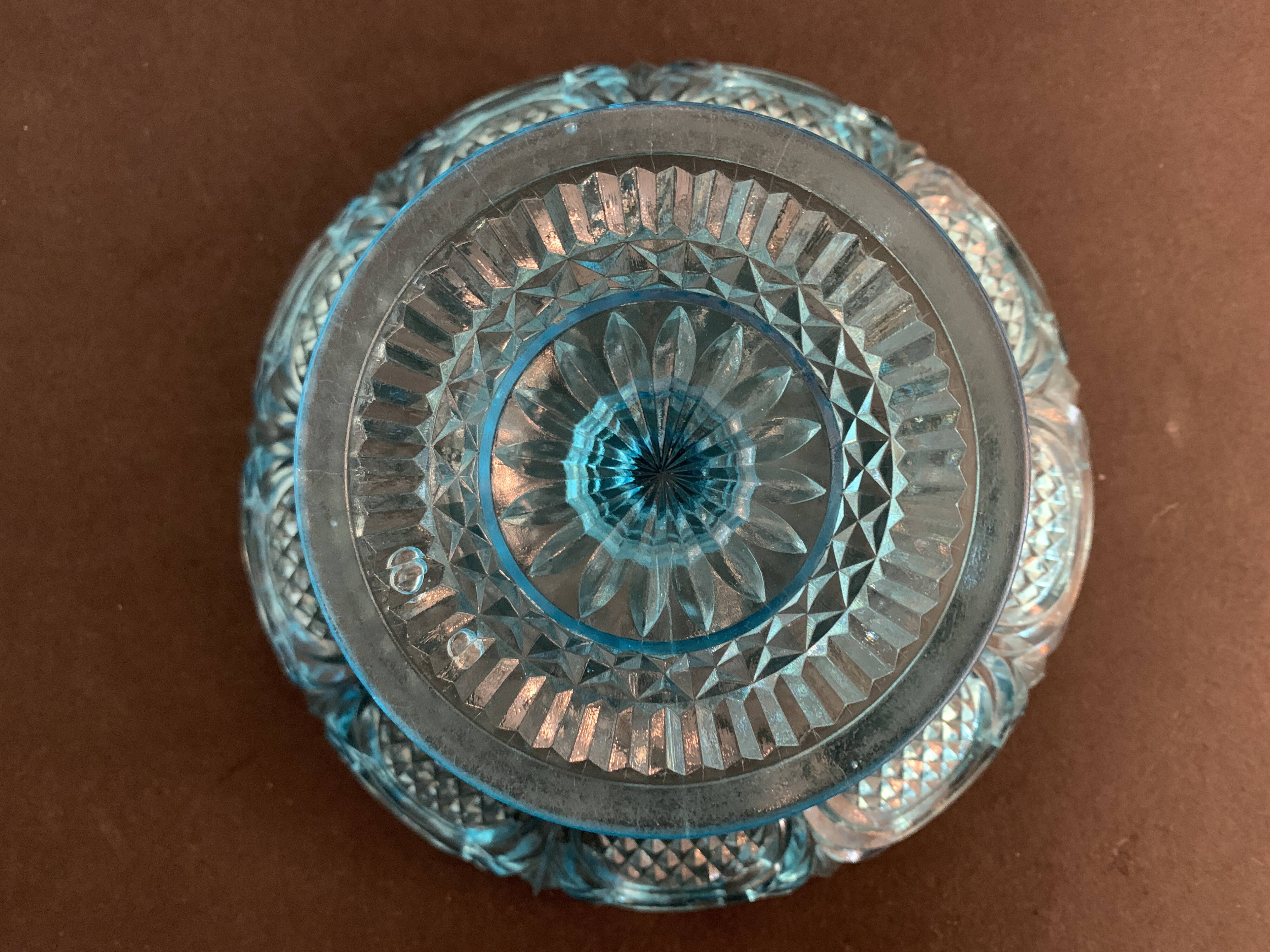 Fruit cup on blue-bubbled glass peder