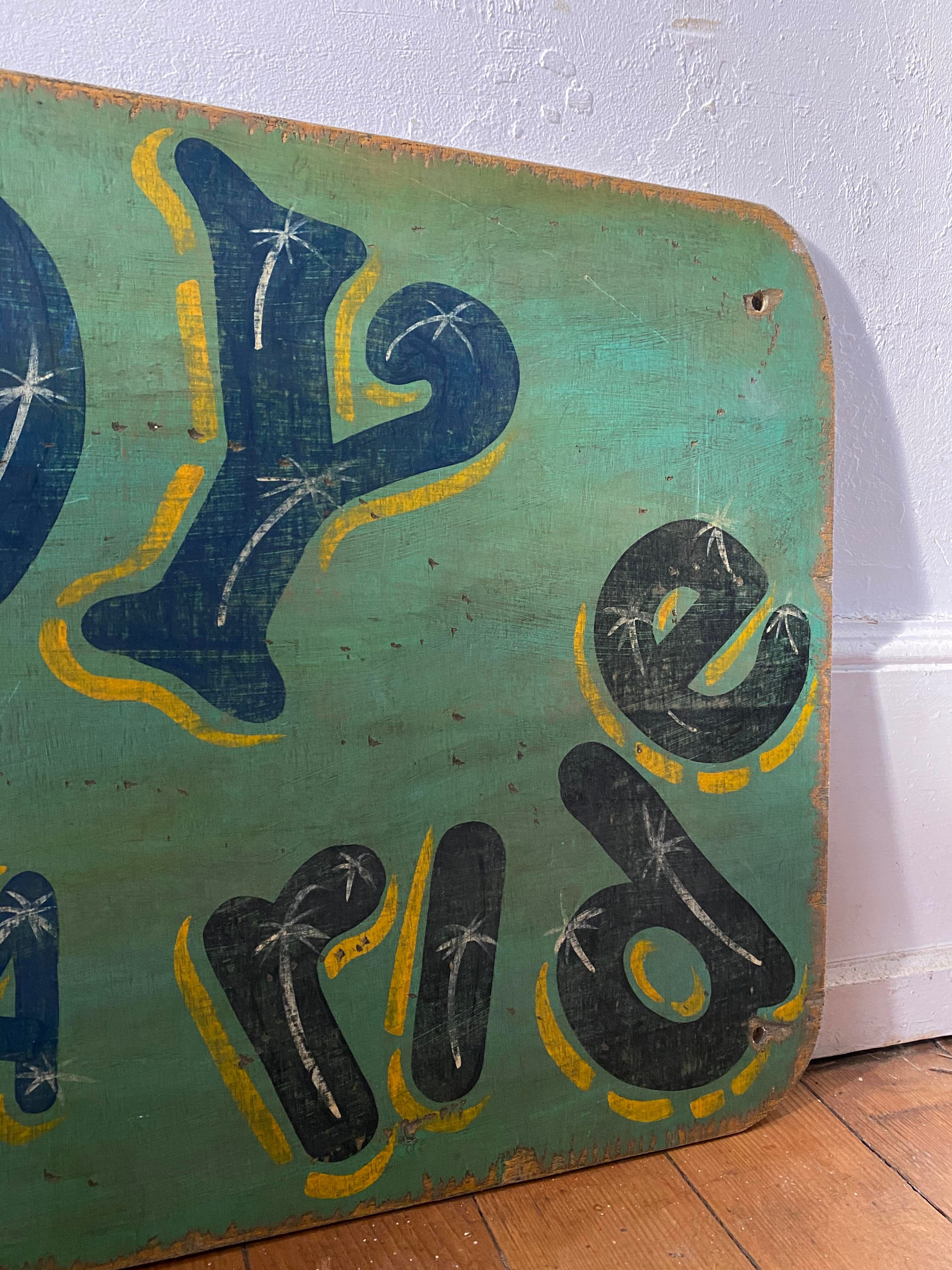 Painted amusement park or funfair sign