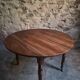 Antique drop-leaf dining table in walnut, France, circa 1900.