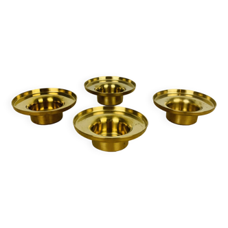 4 golden brass candle holders