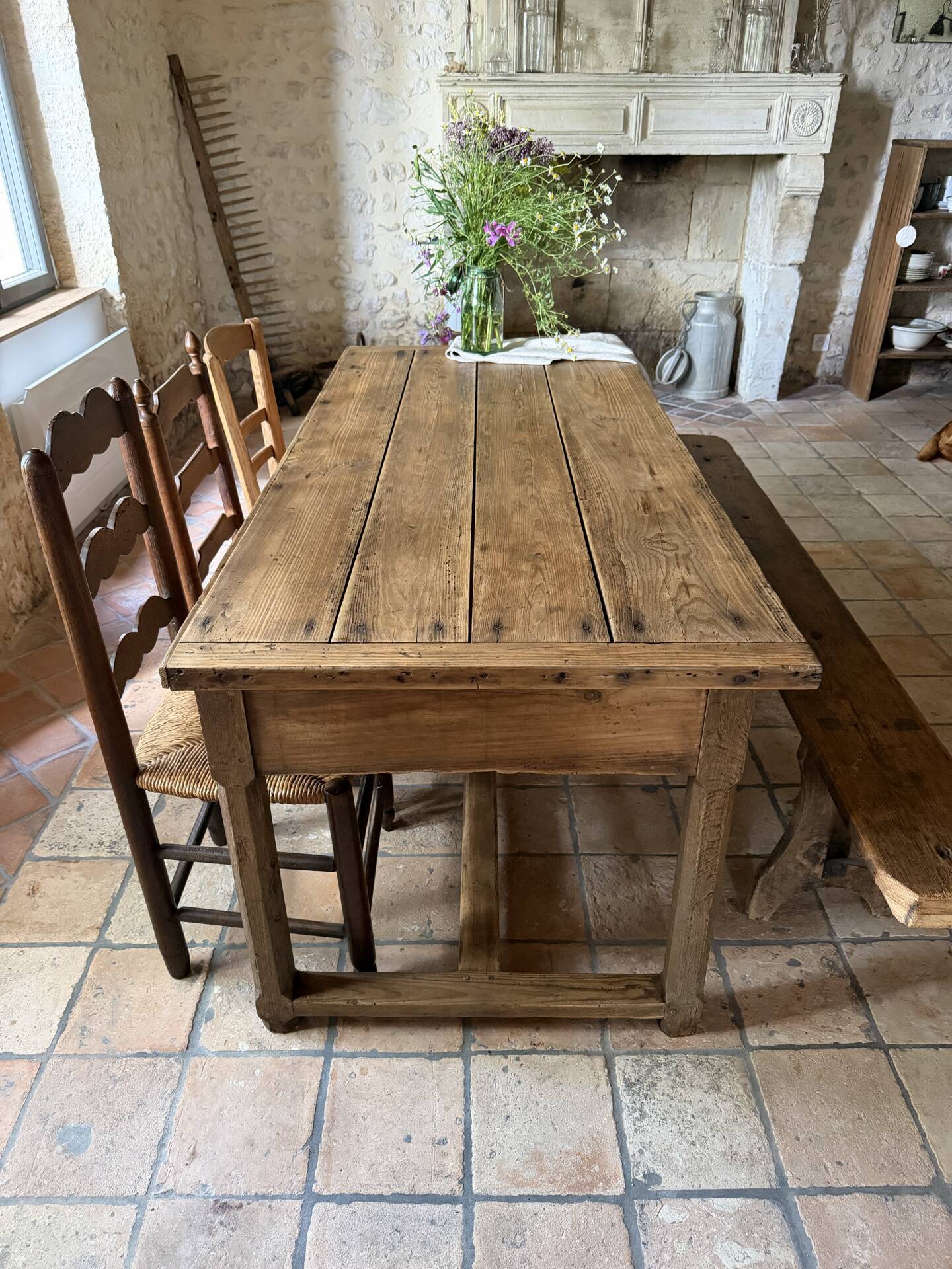Renovated raw wood farmhouse table