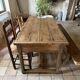 Renovated raw wood farmhouse table