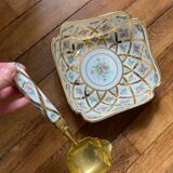 Ladle with earthenware reed