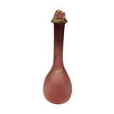 Old pink frosted glass liquor decanter with decorated cap