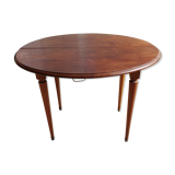 Old mahogany-shuttered round table