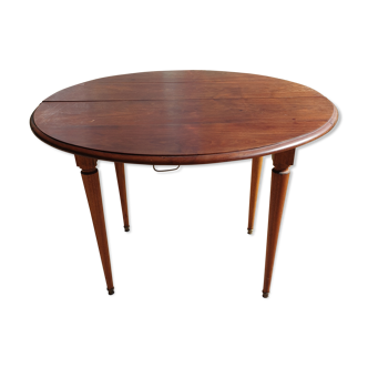 Old mahogany-shuttered round table