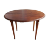 Old mahogany-shuttered round table