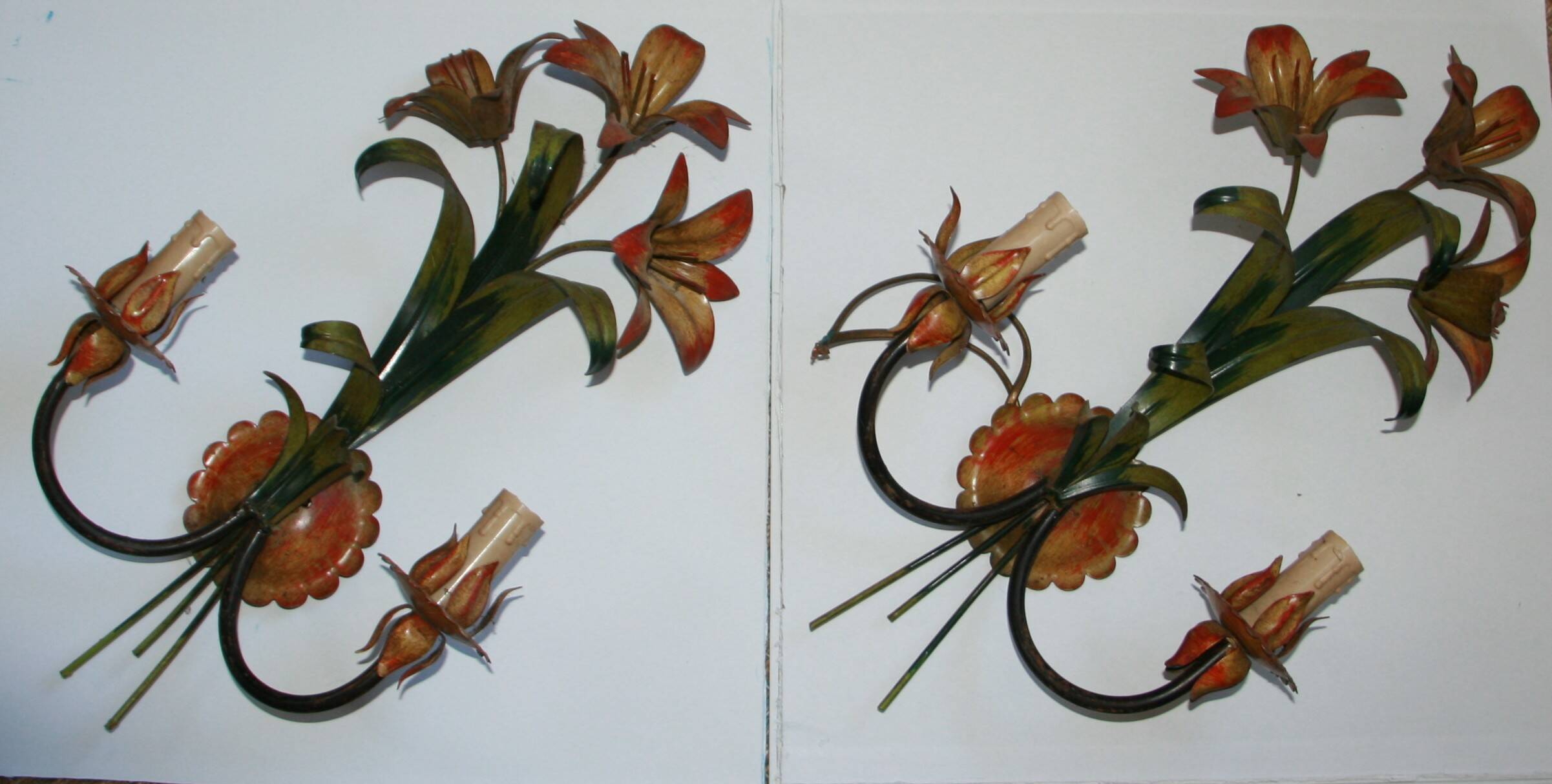 Pair of vintage floral wall sconces in Italian Florentine style metal.