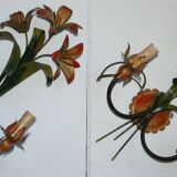 Pair of vintage floral wall sconces in Italian Florentine style metal.