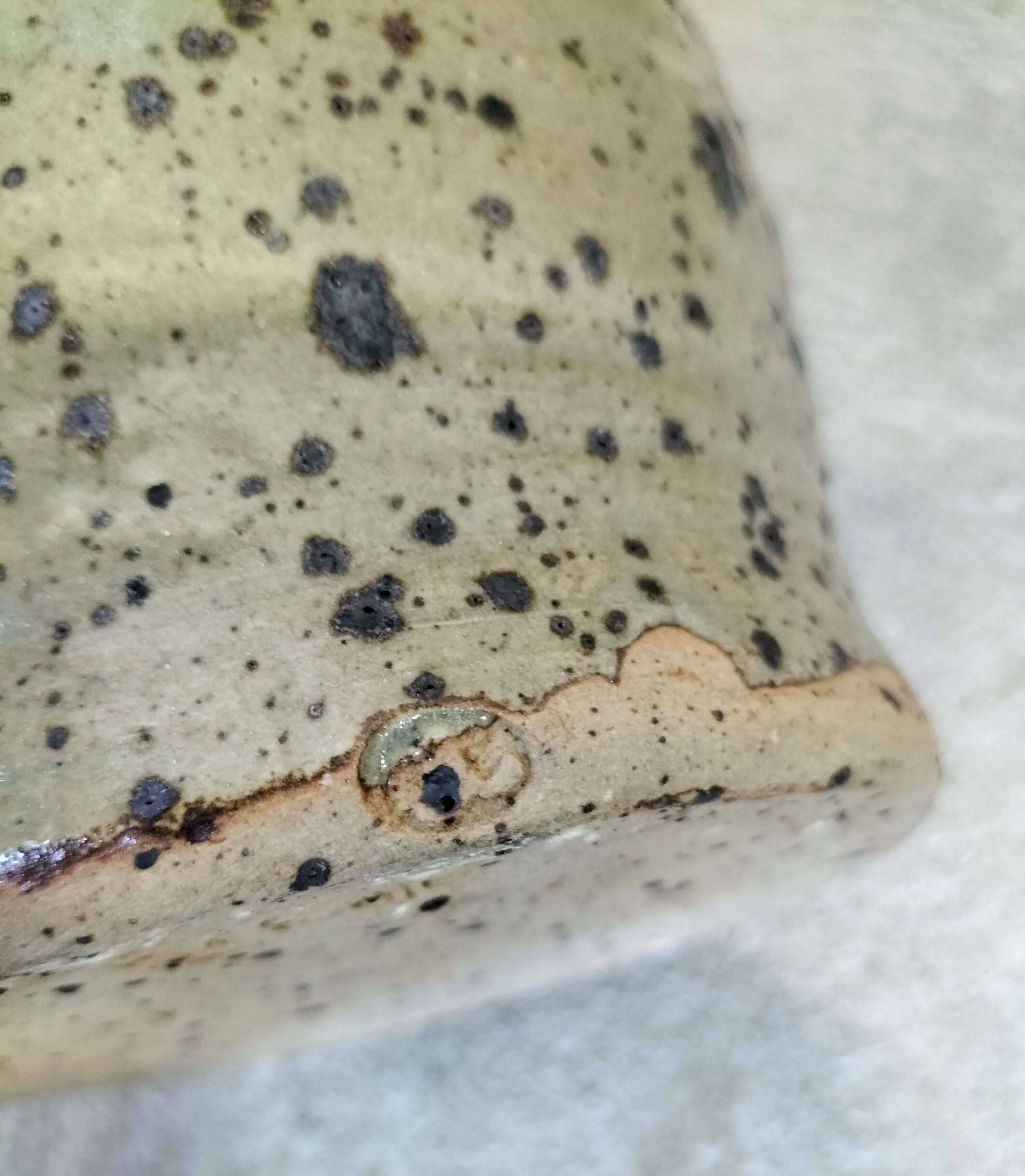 Stoneware pitcher by Gustave Tiffoche