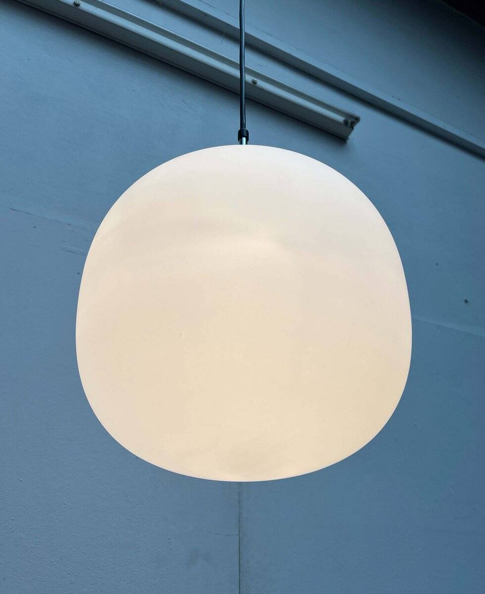 Minimalist suspended glass ball lamp from the vintage German space age by Glashütte Limburg, 1970s.