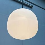 Minimalist suspended glass ball lamp from the vintage German space age by Glashütte Limburg, 1970s.
