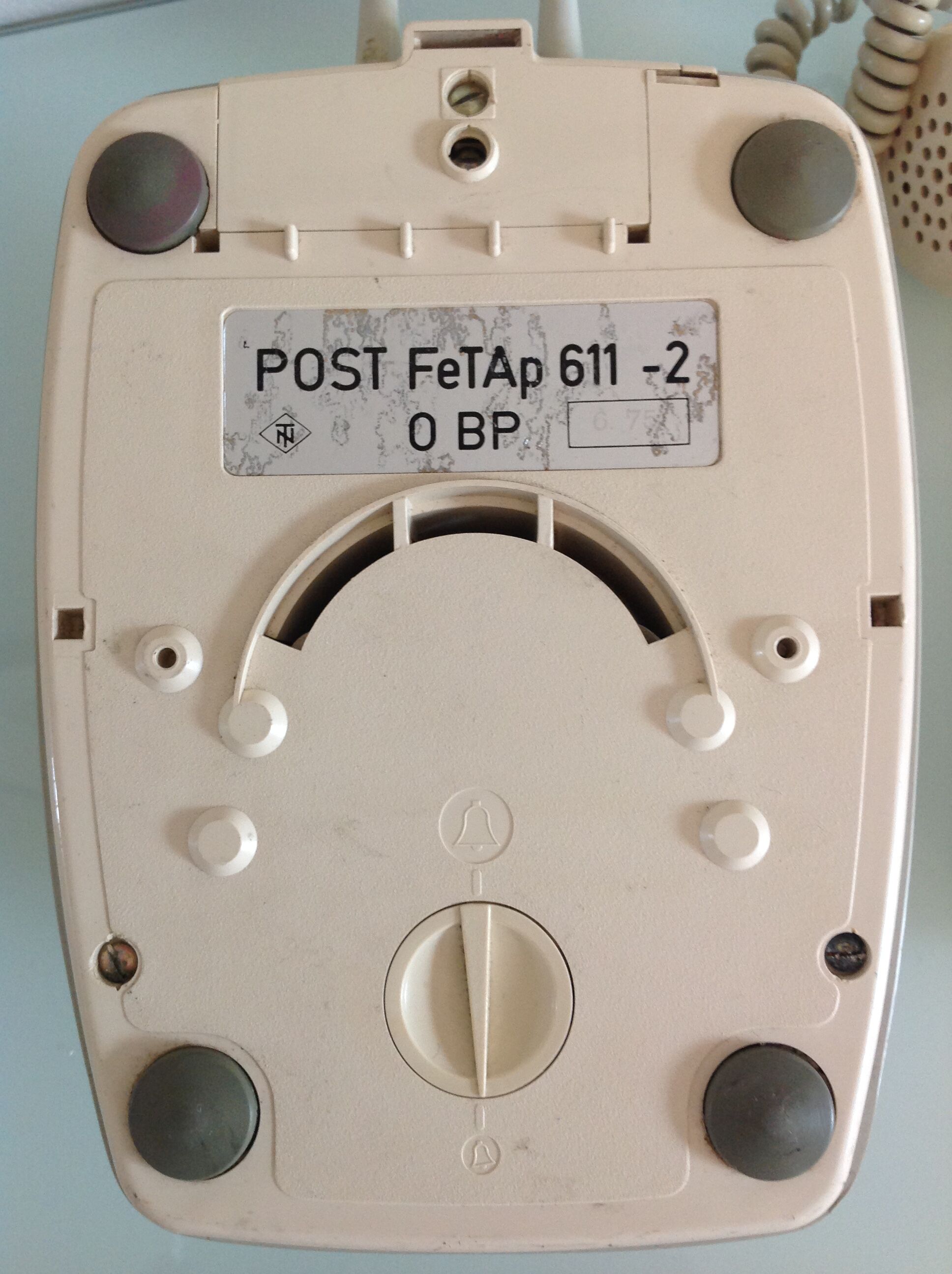 Vintage gray and beige rotary phone