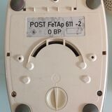 Vintage gray and beige rotary phone