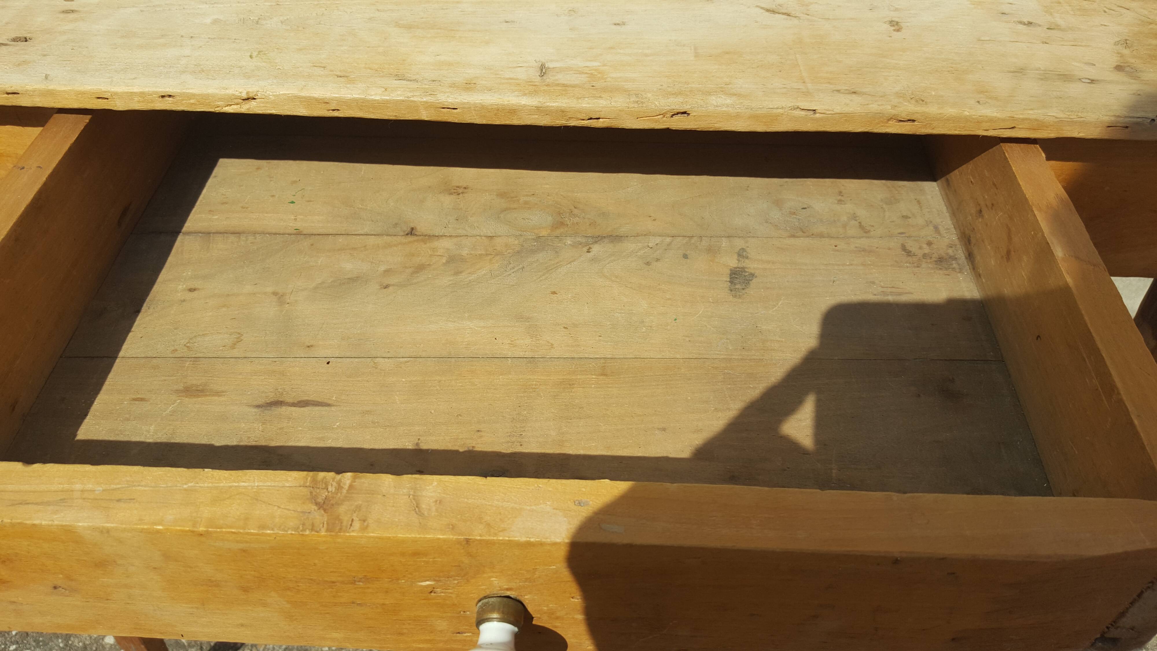 Raw wood farm table with drawer