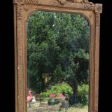 Old gilded mirror with pediment