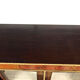 Varnished wood showcase and gold decoration in imitation of the so-called Boulle marquetry