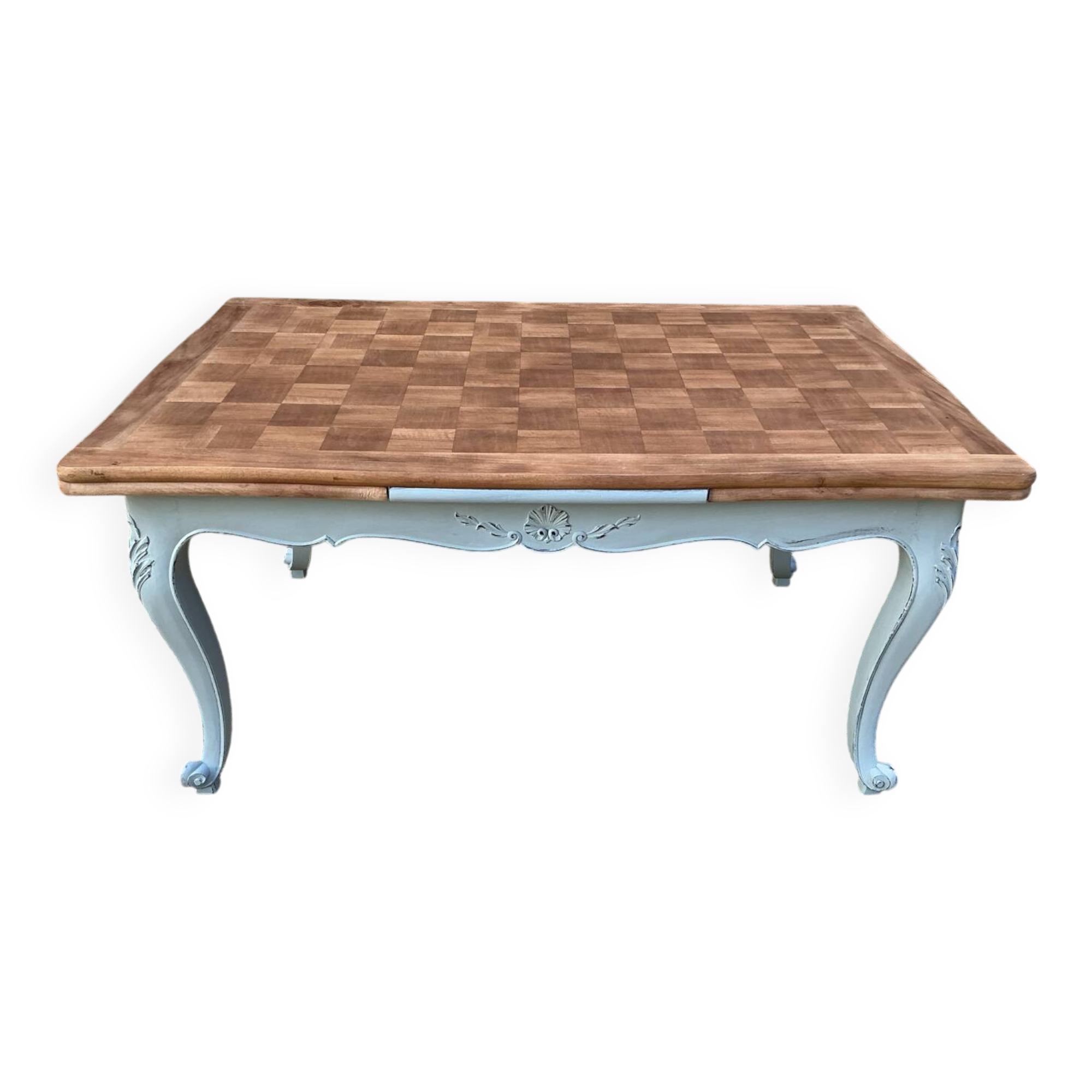 Louis XV style walnut table with a natural wood top.