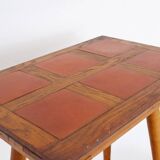 Vintage wooden side table with terracotta top