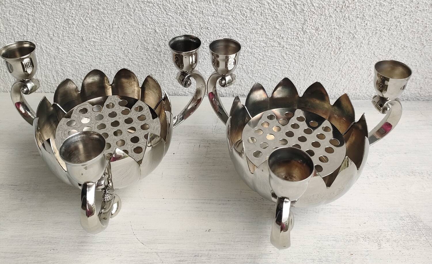 Pair of silver-plated lotus candle holders