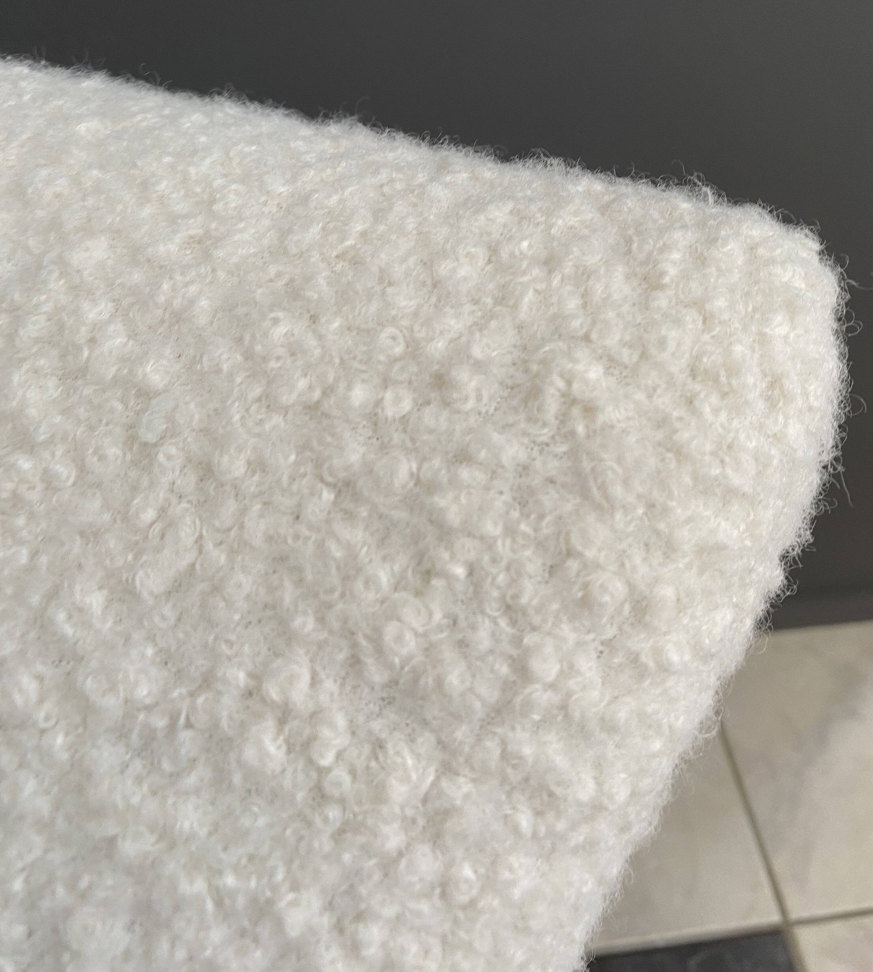 Pair of large rocking chairs reupholstered in White Boucle