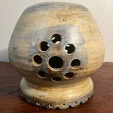 Ceramic suspension with openings