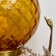 Vintage amber glass globe laying lamp with brass detail