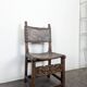Set of 8 Gothic-style chairs in oak and studded leather.