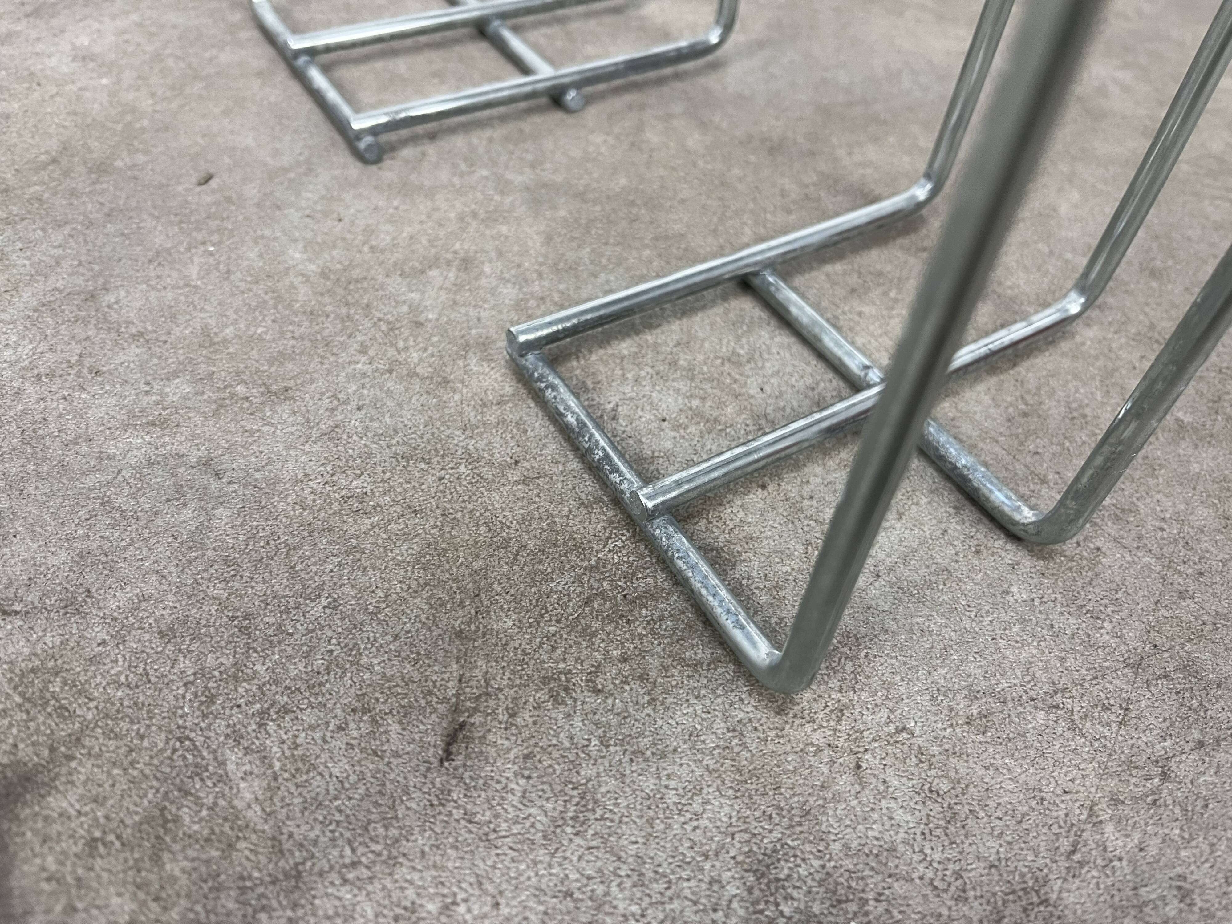 Postmodern chrome metal magazine rack from the 80s