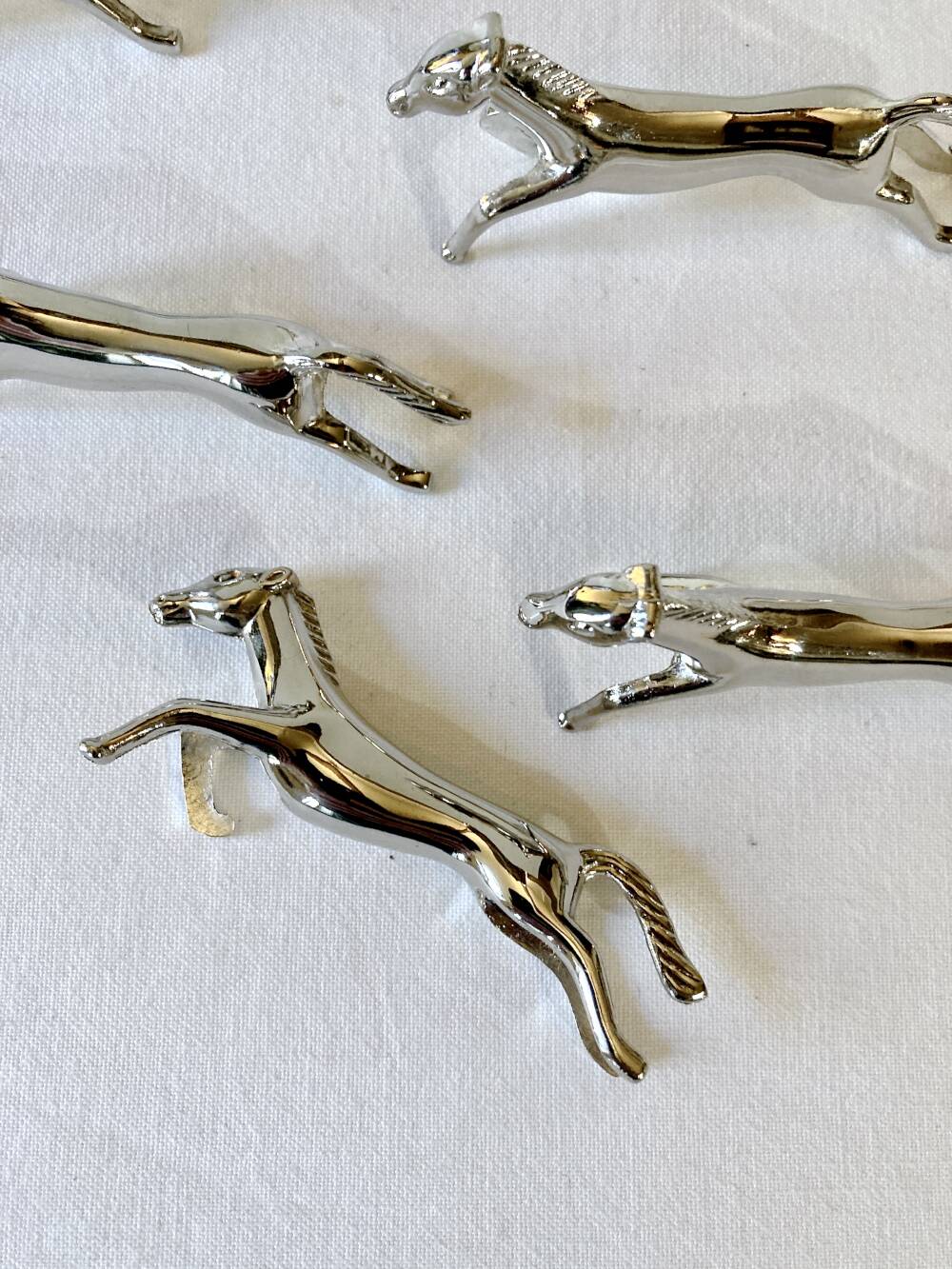 5 silver-plated knife rests in the shape of a horse. 1960s