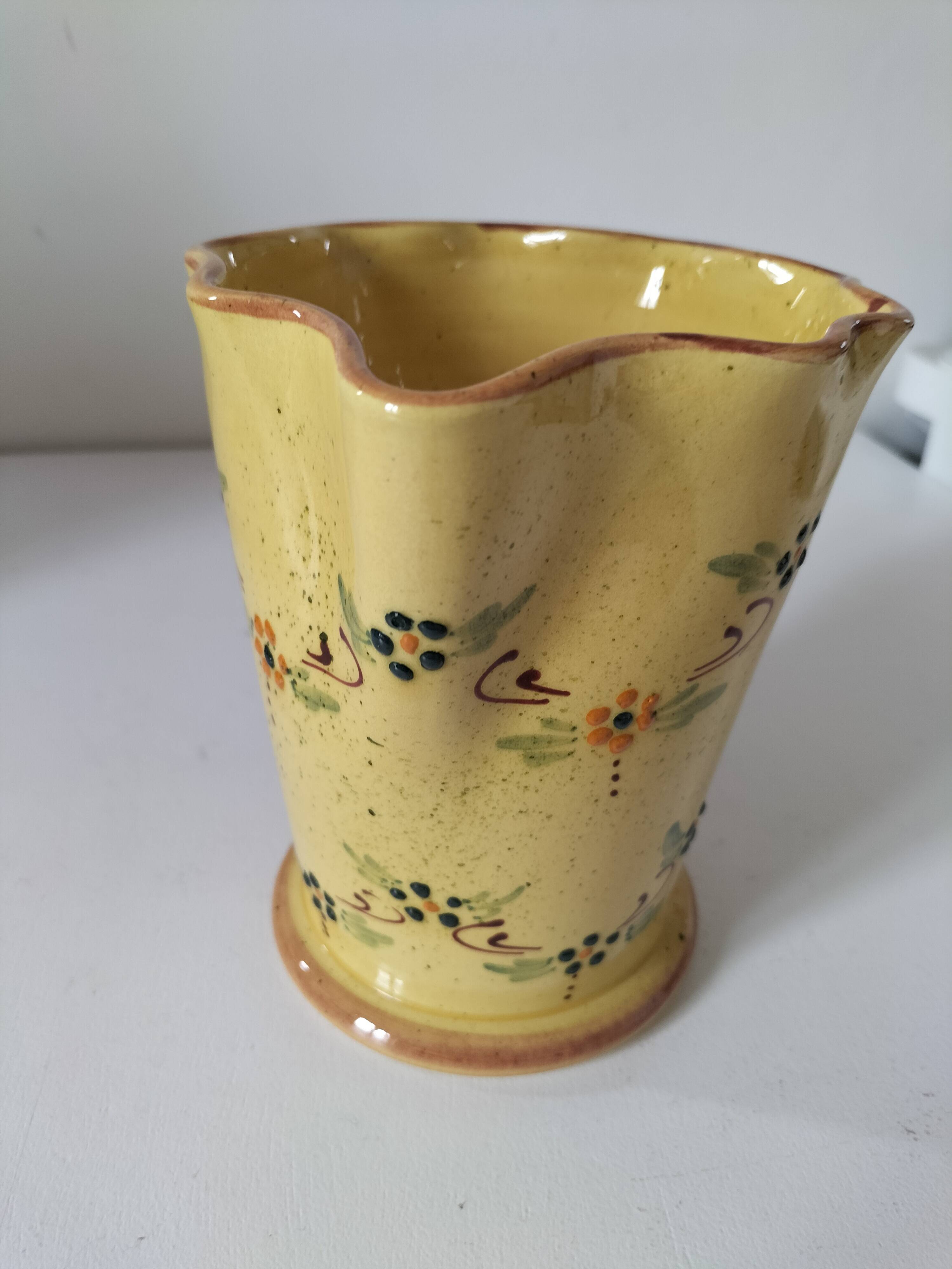 JP Daniel handmade earthenware pitcher – floral decoration on a yellow background