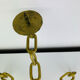 Brutalist candle holder, wrought iron, chain links, gold patina.