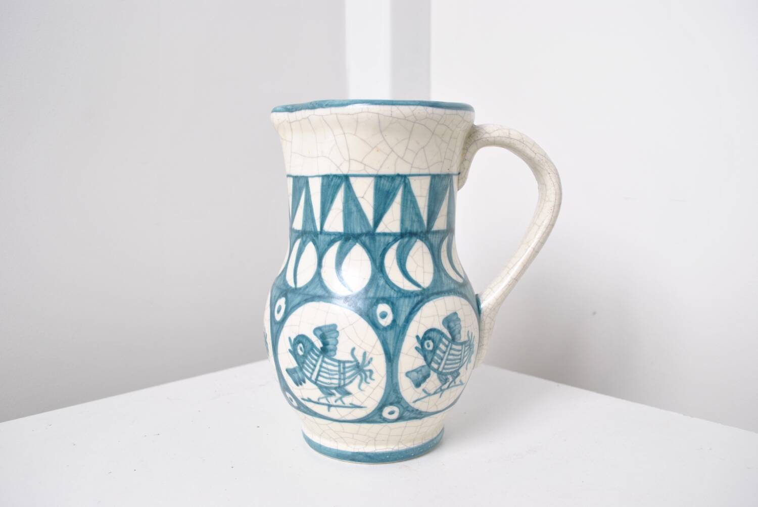 Cracked white earthenware pitcher 1960