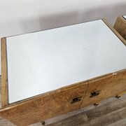 Pair of maple bedside tables from the 1950s with mirrored tops.