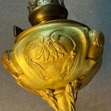 Beautiful and old oil lamp in gilded bronze, attributed to Georges Leleu
