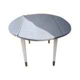 Table with extension cord that folds over the sides